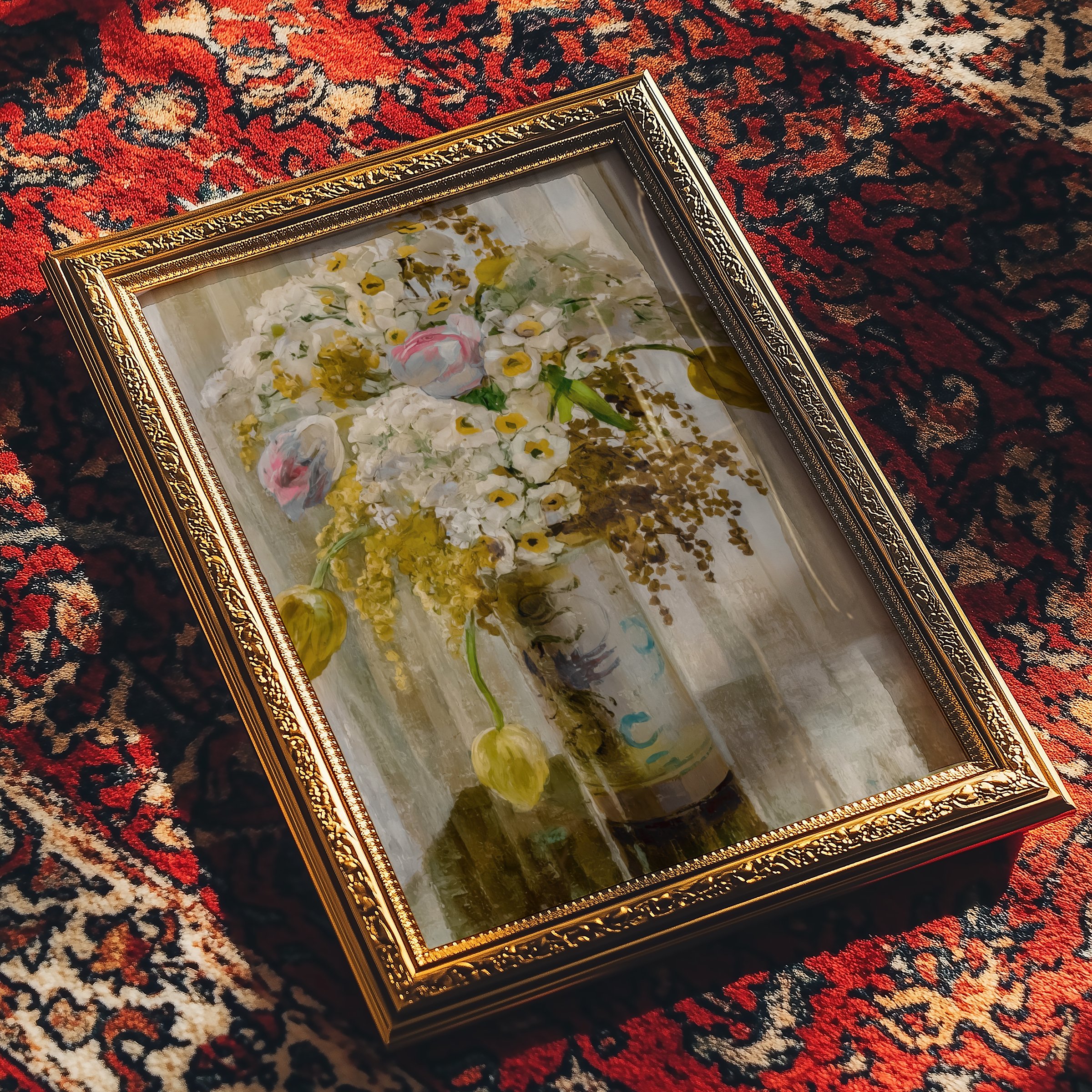 Decorative box with floral design on a patterned rug