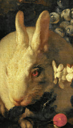 Close-up of a rabbit with flowers and fruits in a dark setting