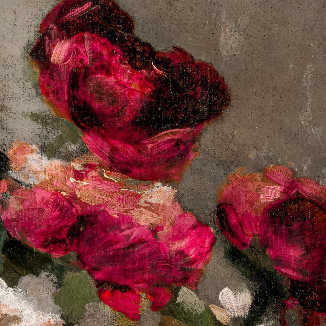 Close-up of pink and red flowers with a textured gray background